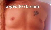 small breasts with a tattoo on chest